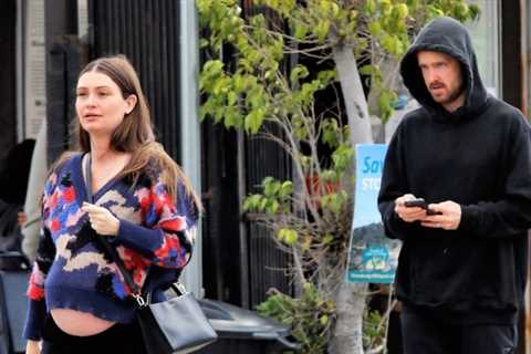 Aaron Paul’s pregnant wife Lauren Parsekian shows off her bare baby bump during the breakfast outing