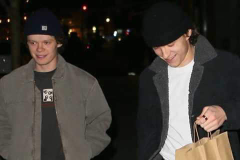 Tom Holland brings home some leftovers after dinner with brother Harry
