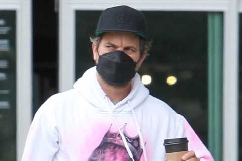 Joshua Jackson wears a hoodie with the face of Peter Dinklage while running errands